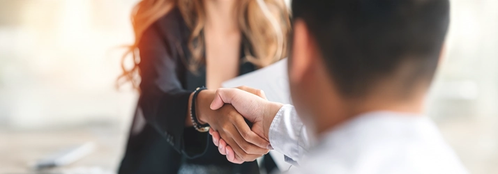 Chiropractic Reno NV Hand Shake two people shaking hands.