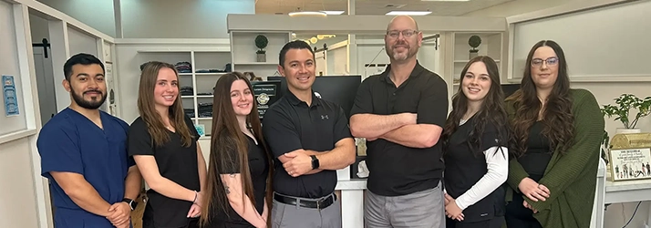 Chiropractor Reno NV Shain Smith With Full Team Hero